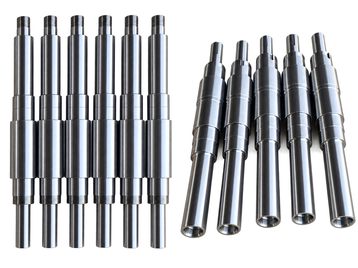 Previously supplied batch of machined shaft components showing stepped diameters, threaded ends and keyway features