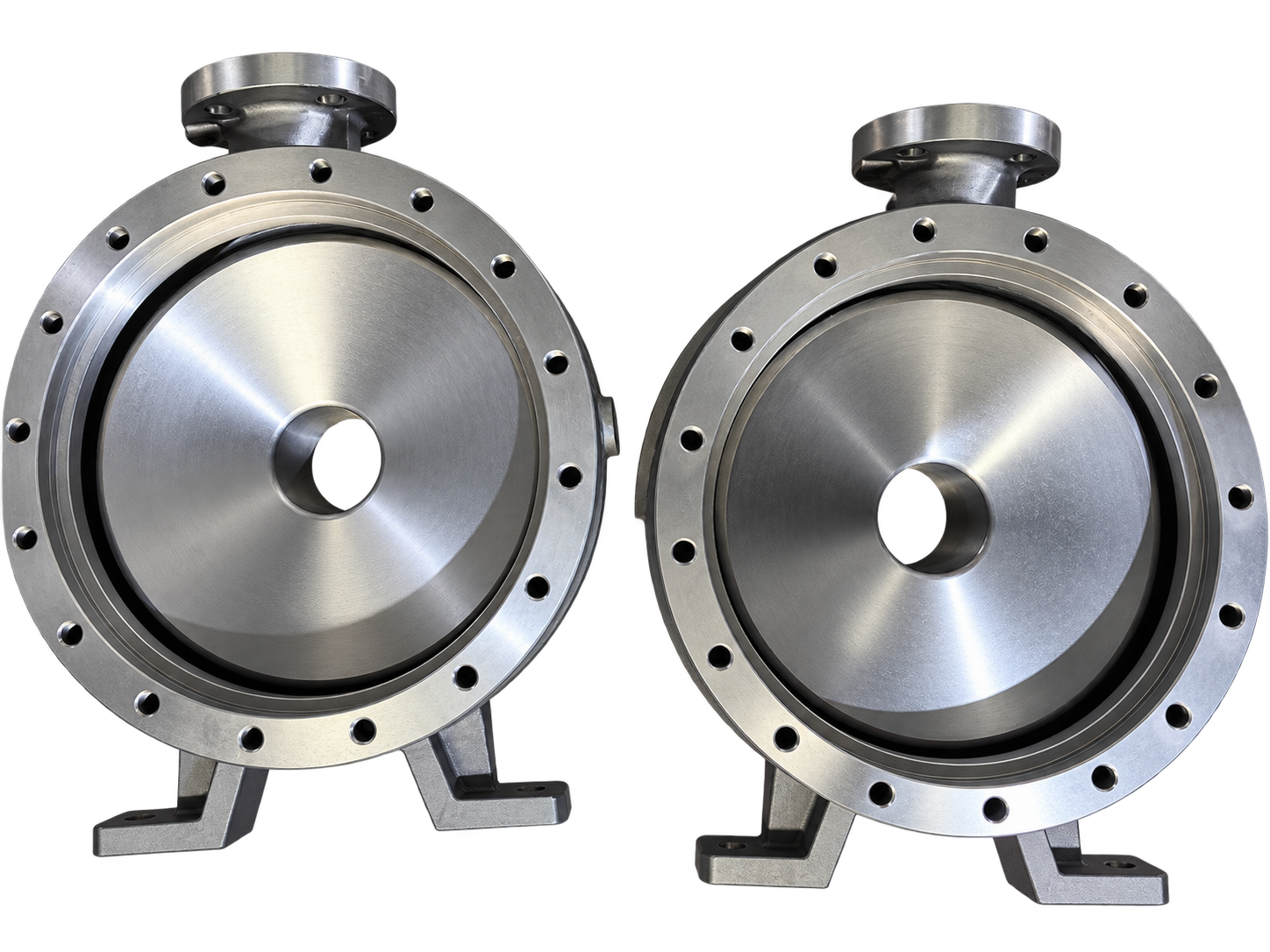 Two machined pump covers showing circular mating faces